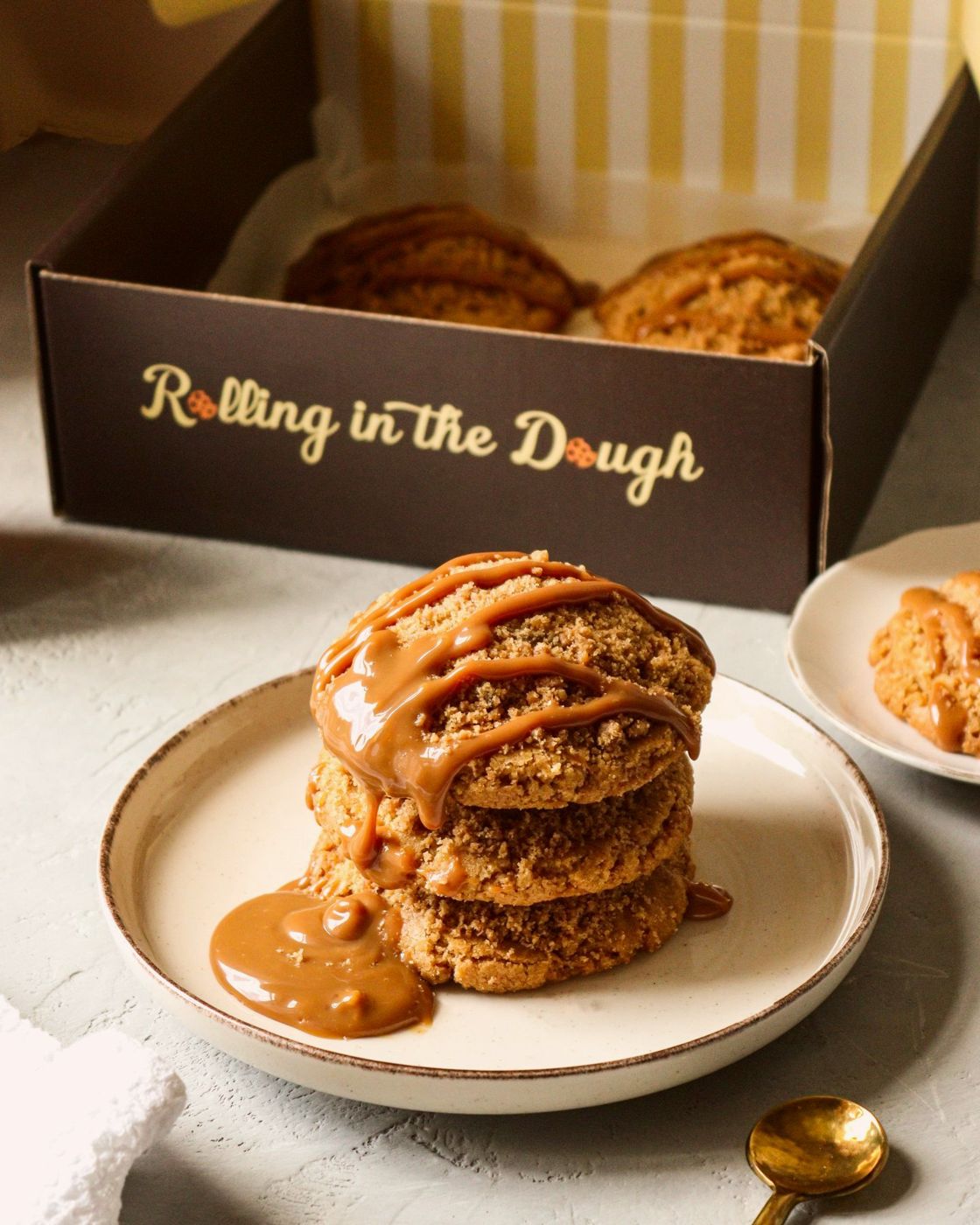 Apple crumble cookies stacked on a plate